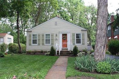 Transformed landscaping in front and backyard! New shutters and awnings.