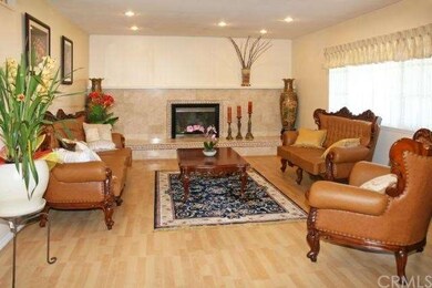 Formal Living Room with Marble Fireplace