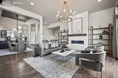 MAIN LEVEL GREAT ROOM WITH FIREPLACE AND DINING RO