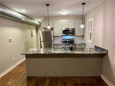 3704 Baltimore Ave unit 2S, Kansas City, MO 64111 - photo 5