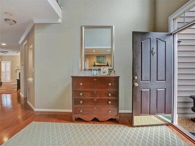 2-Story Foyer with hardwood flooring.