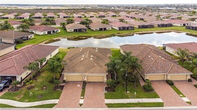 AERIAL VIEW OF VILLA.  PARK 2 CARS INSIDE GARAGE E