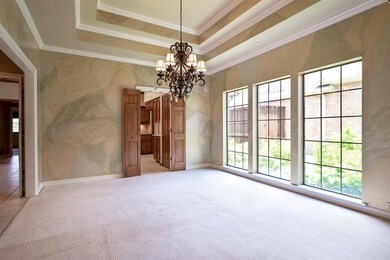 Ample windows making the dining room light and bri
