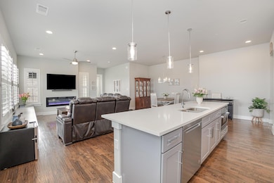 Open floor plan from kitchen to living and dining 