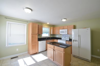 Kitchen With Granite Counters, Dishwasher, Microwave, Stove, Refrigerator, Washer & Dryer
