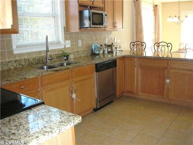 Kitchen - Updated kitchen has GRANITE counter top,