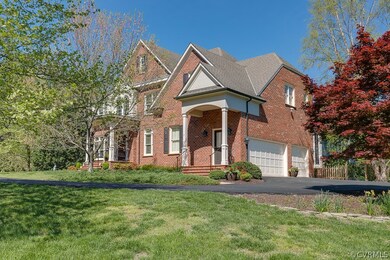 Side view showing the 3 car garage