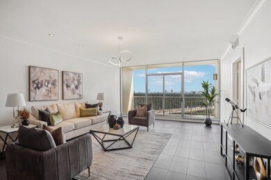 Living room with view of balcony overlooking downt