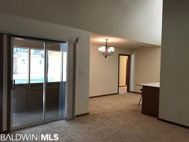 view to dining area and kitchen