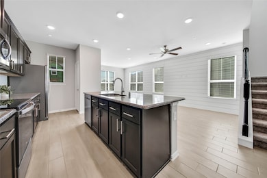 This kitchen has plenty of cabinet space to satisf