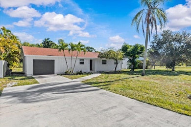 8379 SE Camellia Dr, Hobe Sound, FL 33455 - photo 2