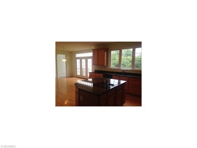 Large center island and eat in area with access to