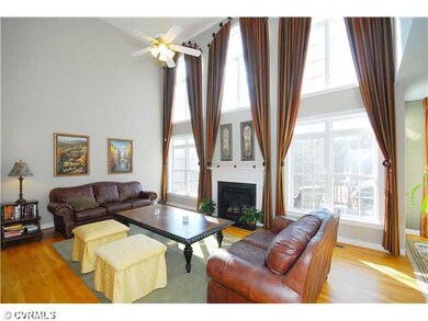Living Room - The two-story LIVING ROOM has dramat