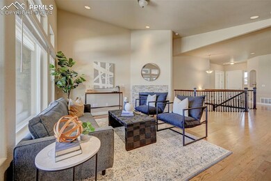 Living room with high vaulted ceiling, wood-type f