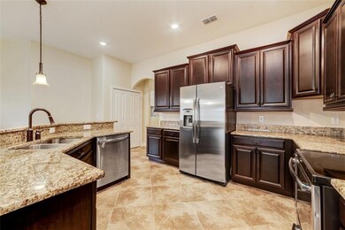 Spacious kitchen with granite countertops