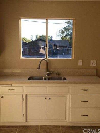 New quartz counter tops and tile flooring in the k
