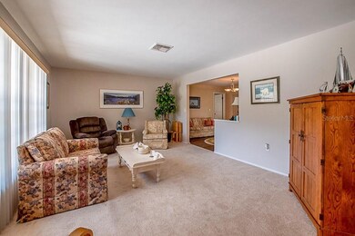 Large Family Room with huge window.