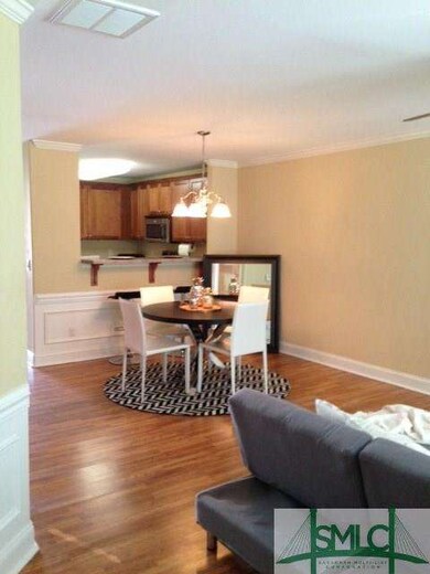 Flowing wood laminate floors on the main level inv