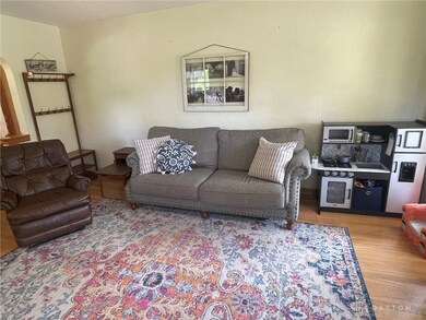 Living room has plenty of space for family fun.