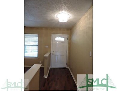 Foyer. New lighting and the wood flooring extends 