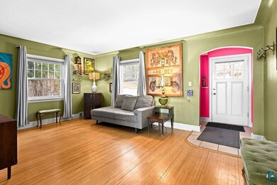 Living area featuring hardwood / wood-style floors