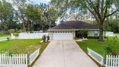 Home offers completely fenced yard.