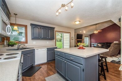 Kitchen opens to living room.