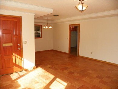 Front doors open to family room and dining area