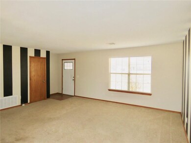 View of the front door from the breakfast area.