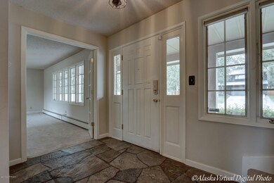 French doors open to the living room