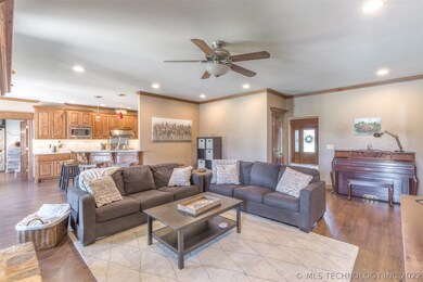 The family room opens to the kitchen, features a s