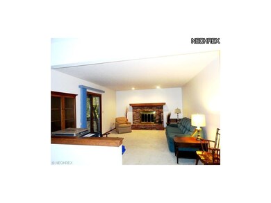 Family room with wood burning fireplace