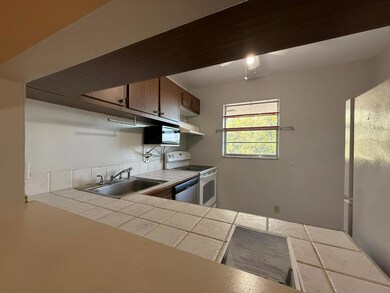 12009 Poinciana Blvd unit 204, Royal Palm Beach, FL 33411 - photo 3