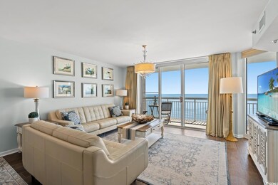 Living area featuring visible vents, baseboards, a