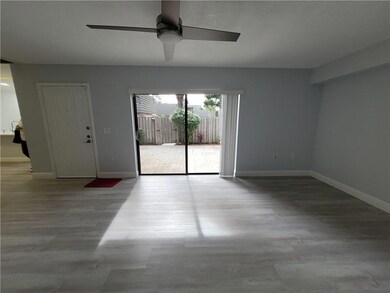 Living Room (facing front door and sliding doors)