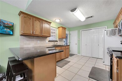 Pantry on the left. Washer/Dryer thru the bi-fold