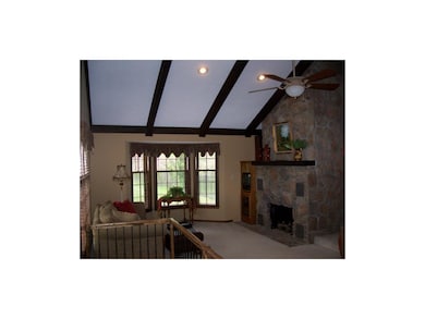 Great Room features cathedral ceiling, stone firep