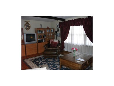 LARGE PICTURE WINDOW FROM LIVING ROOM