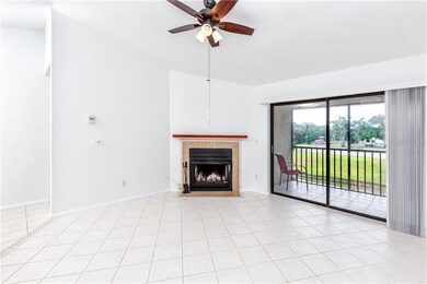 Living Room with Fireplace with screened-in Balcon