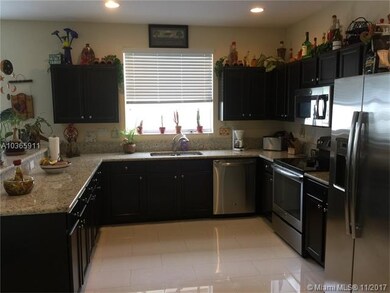 SPACIOUS KITCHEN WITH CAPPUCCINO WOOD CABINETS, ST