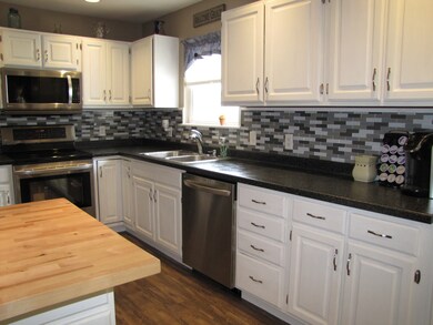 Notice the newer stainless steel appliances