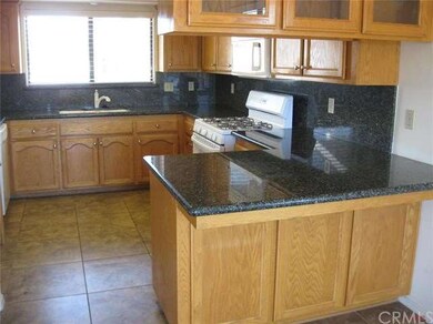 Spacious kitchen with eat up breakfast bar!
