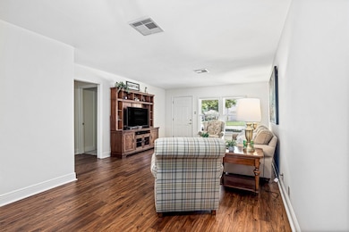 Pocket door in hallway separates living from bedro