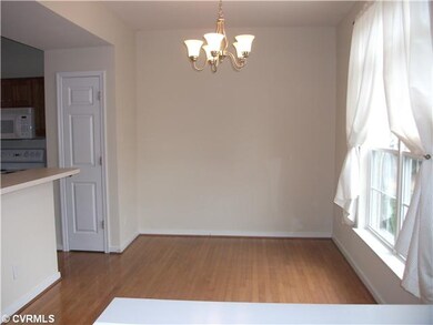 Dining Room - Beautiful hardwood floors compliment