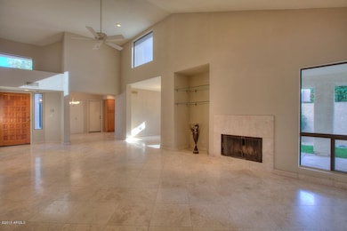 Open Family Room Has Fireplace