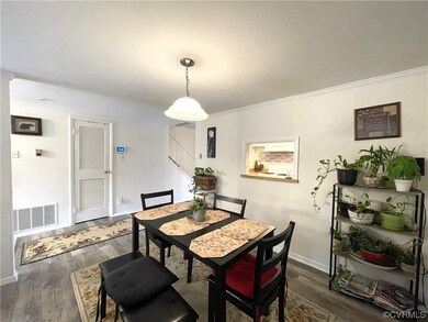 Dining space featuring dark hardwood / wood-style