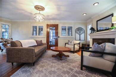 Formal Living Room with Hardwood Flrs, Gas FP, acc