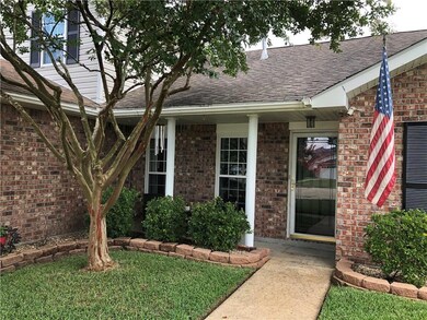 Warm and inviting front entrance with immaculate l