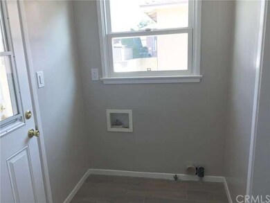 Separate laundry room with gas and electric dryer 