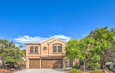 View of front of property with an attached garage,